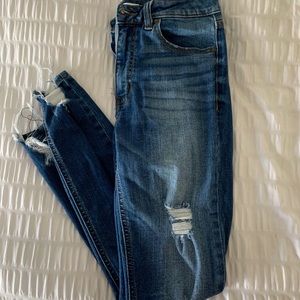 Distressed cropped skinny jeans